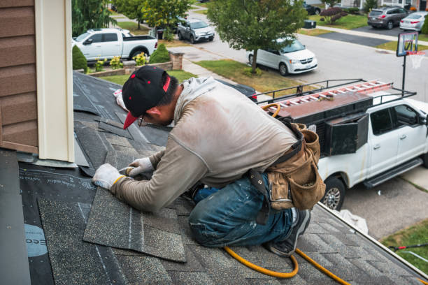 Professional Roof Replacement technician working in Montesano, WA